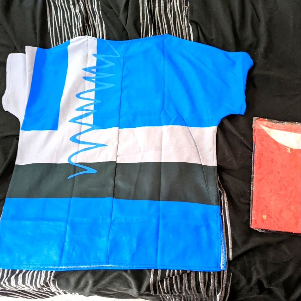Blouses that are a size Large. Brand new, never been worn.